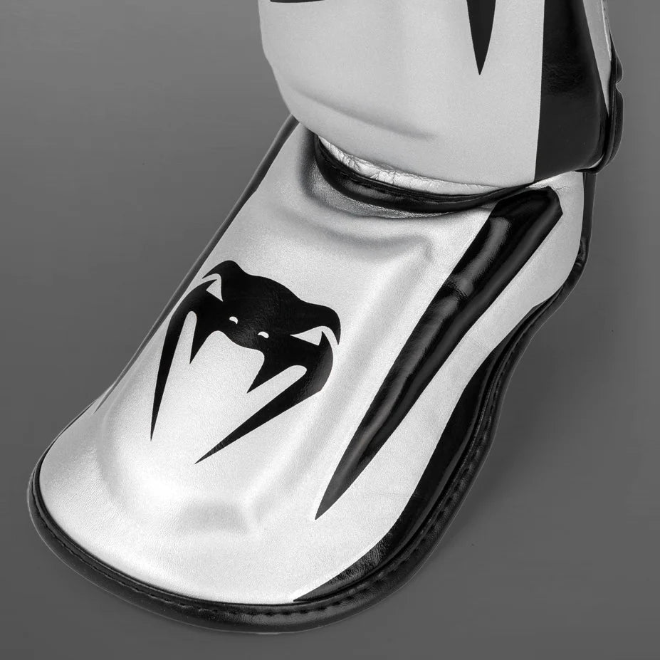 Espinilleras Venum Elite Standup  - Plata/Negro