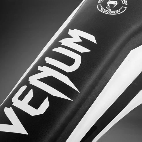 Espinilleras Venum Elite  - Negro/Blanco