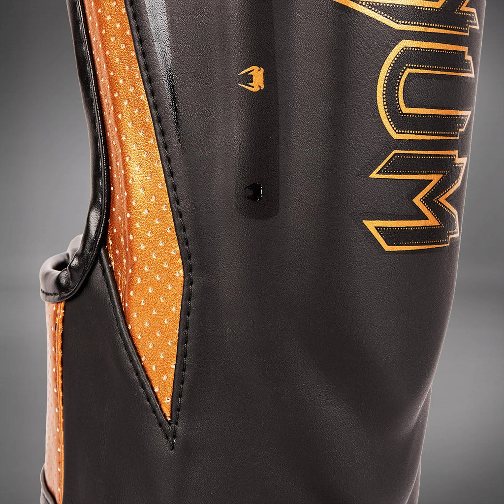 Espinilleras Venum Elite Evo  - Negro/Bronce